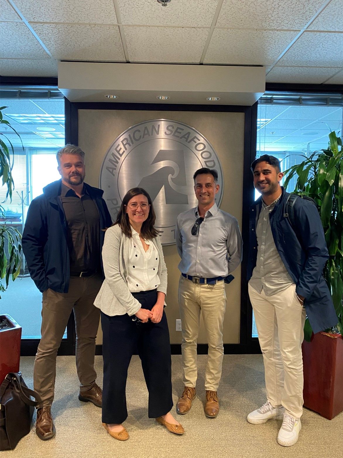 Tim Fitzgerald, Chief Sustainability Officer of American Seafoods with Nils Parborg, Susie Jahren and Mandip Singh at American Seafoods headquarter in Seattle